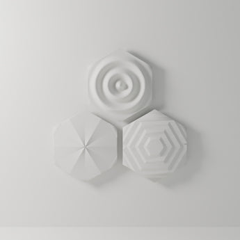 Hex Relief Wall Art, Set of 3 in matte white, 3D printed — studio render