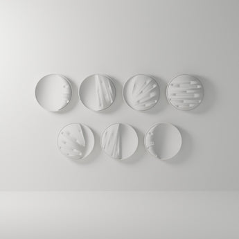 Moon Phase Wall Set of 7 in matte white, 3D printed — studio render
