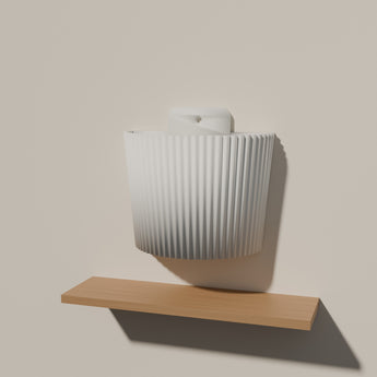 Ribbed Wall Planter styled in a room — render