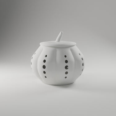 Perforated Pumpkin Luminary in white, 3D printed — studio render