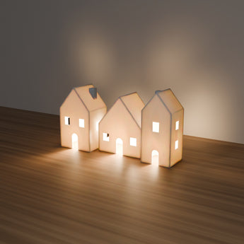 Snow Village LED Houses, Set of 3 glowing with an LED light — render