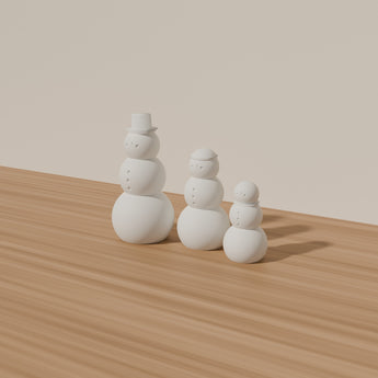 Minimal Snowman Trio styled in a room — render