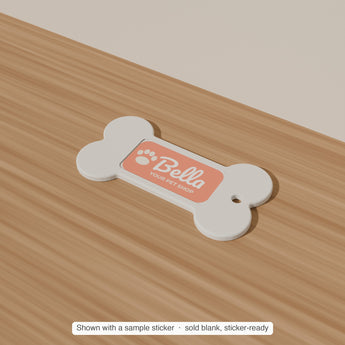 Bone Keychain Blank with a sample sticker applied — render